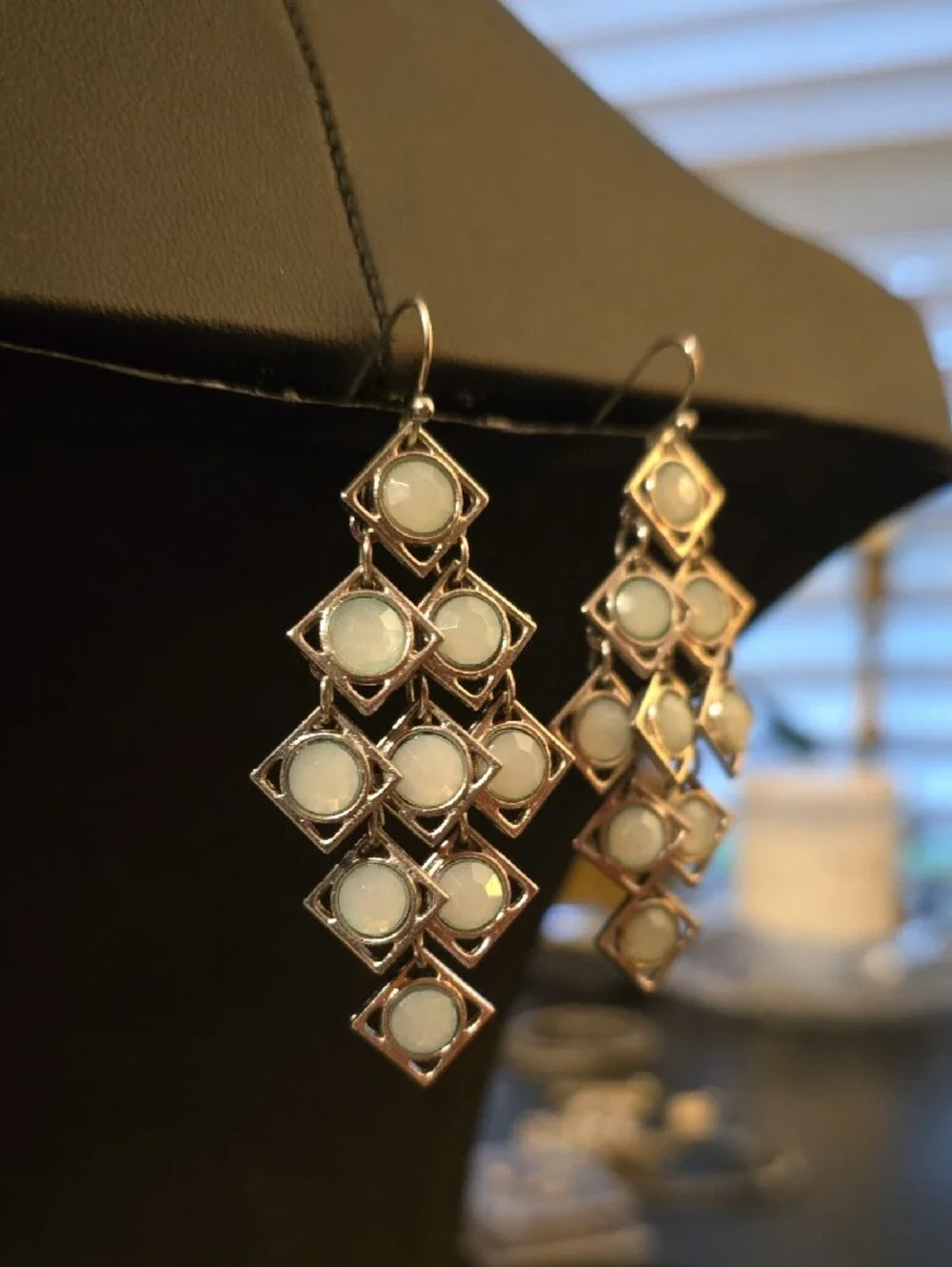 Silver Tone Geometric Dangle Earrings with Light Blue Opalescent Stones